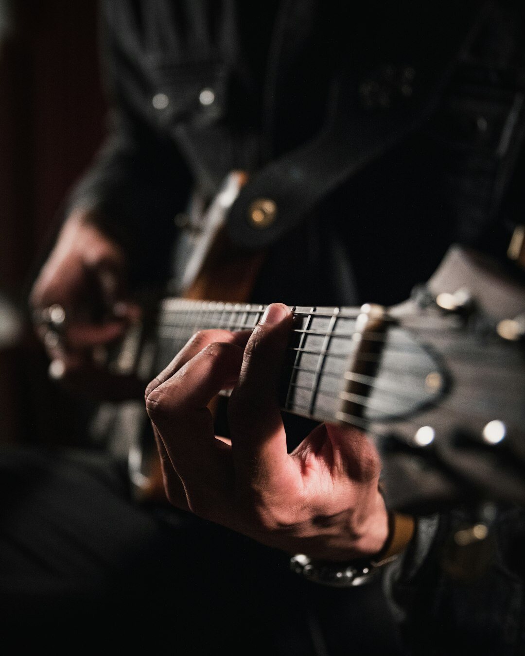 musician playing guitar